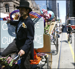 Earth Day March with Shamez Amlani in pedicab in Toronto