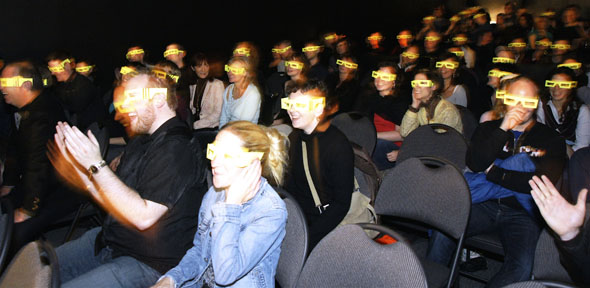 The Comedy Bar's Grand Opening in Toronto, with the audience watching in Bee Vision