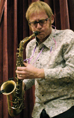 Richard Underhill plays the saxophone at Spacing magazine's fifth anniversary party in Toronto