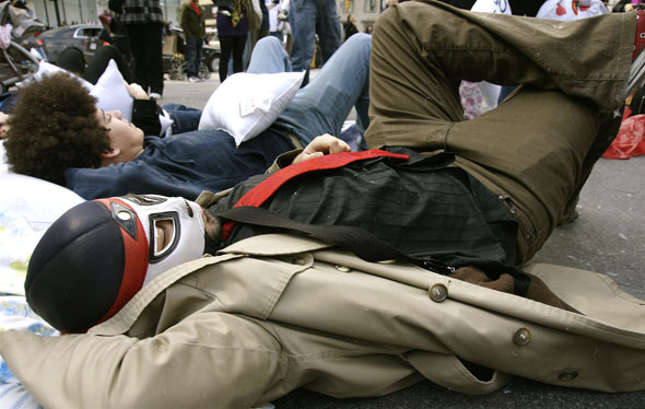 Saajid Motala dressed in a Mexican wrestling mask during the pillow fight in Yonge-Dundas Square in Toronto 2009